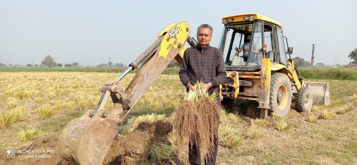 Farmer with modern farming equipment
